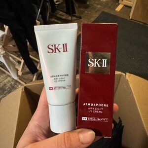 SK-II Atmosphere Airy Light UV Cream - White and Red